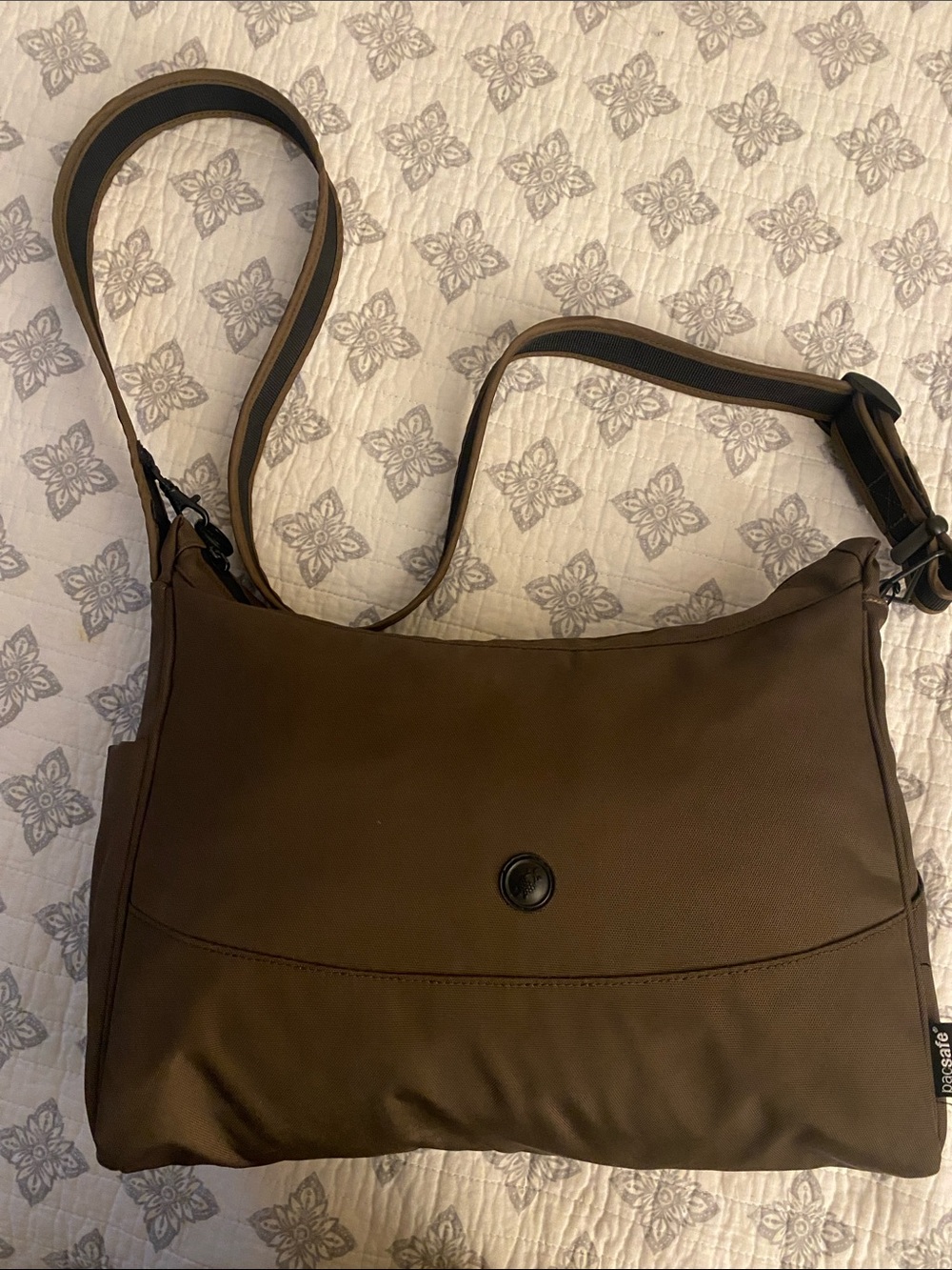 Pacsafe brown Travel Handbag with light blue Interior Label